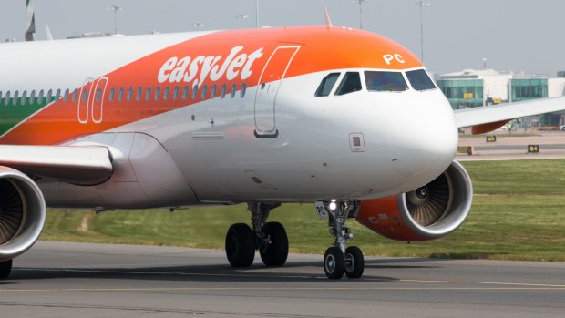 A passenger stepped up to fly an easyJet plane after a pilot shortage caused a delay.