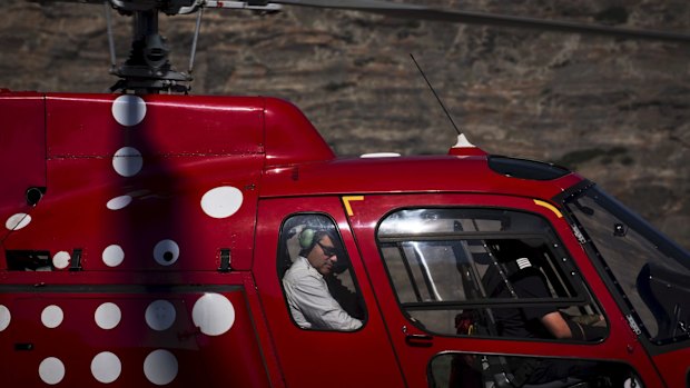 Laurence Smith, head of the geography department at the University of California, Los Angeles, leaves in a helicopter in July from Kangerlussuaq, Greenland to select research sites inland on the Greenland ice sheet.