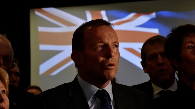 Former prime minister Tony Abbott sings the national anthem.