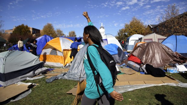 A victory salute at the  tent encampment set up by University of Missouri student protesters on Monday. 