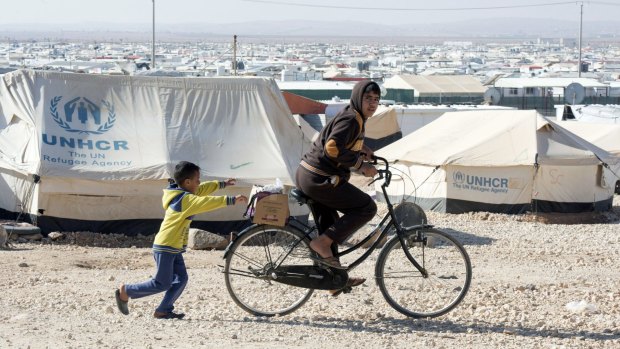 Young Syrian refugees play in the Zaatari Refugee Camp in Jordan last week. 