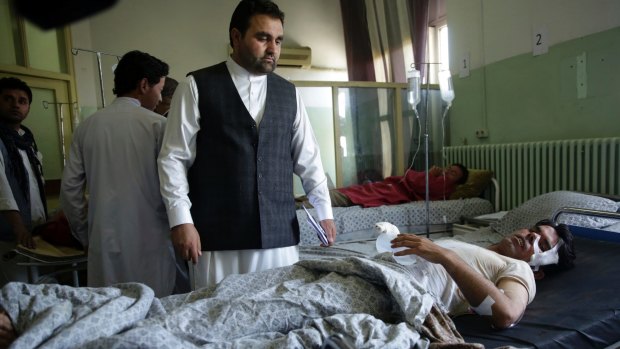 Wounded men lie in Wazir Akbar Khan Hospital in Kabul, Afghanistan.