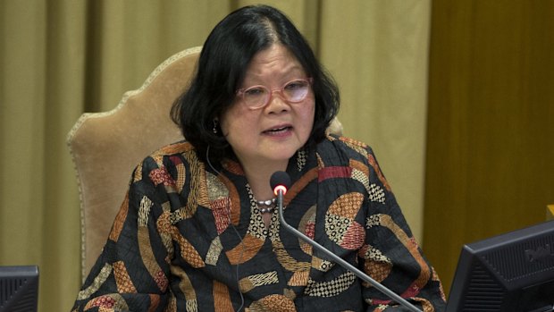 Economist Carolyn Woo addresses the media during a press conference to present Pope Francis' environment encyclical, at the Vatican. 