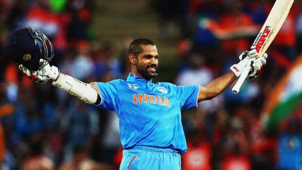 Indian opener Shikhar Dhawan celebrates after scoring his second century in the tournament.