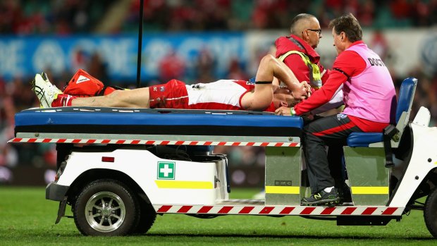 Devastated: Luke Parker after being injured in a tackle during the round 20 AFL match between the Sydney Swans and the Collingwood Magpies at SCG last August.