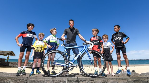 Cadel Evans with young cyclists at the launch of the Great Ocean Road Race.