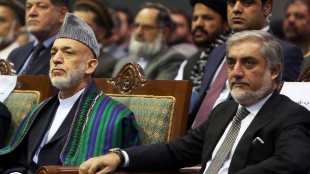 The decision of Afghan President Hamid Karzai, left, to hand over power at the end of his term threw warlords under his aegis into a new landscape.