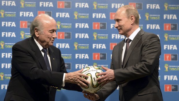 Allies: Russian President Vladimir Putin and FIFA President Sepp Blatter take part in the official handover ceremony for the 2018 World Cup - scheduled to take place in Russia - in Rio de Janeiro last July.