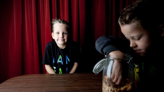 Ned, 7, is allergic to nuts but his parents have decided the house should not be nut-free. 