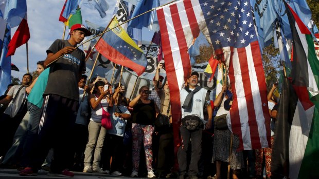 Supporters of Venezuela's President Nicolas Maduro shout slogans as they burn a US national flag during a demonstration outside the US Embassy in Buenos Aires last month.