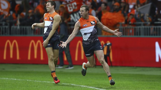 Veteran savvy: The Giants' Steve Johnson rejoices after a goal during the clash with the Sydney Swans.