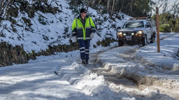 Transport Canberra and City Services? Project Officer Adam Melville looks after icy or snow affected roads in the Namadgi National Park area (near the Mount Franklin chalet site).