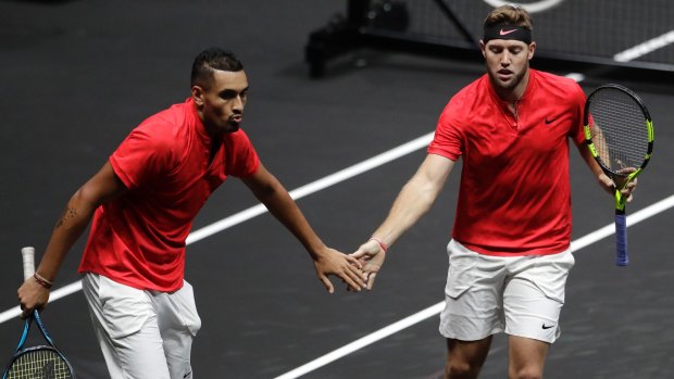 World's Nick Kyrgios, left, and Jack Sock, right, celebrate winning a point against Europe's Rafael Nadal and Tomas Berdych during their Laver Cup doubles tennis match.