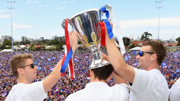 Red, white and blue - fans unite at Whitten Oval after the Bulldog's Grand Final triumph.