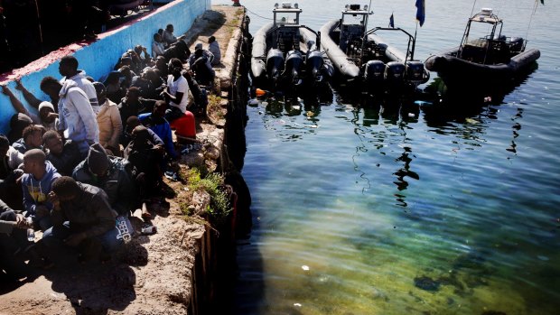 More than 100 migrants were rescued by two coastal guards off Tripoli, Libya, last month, after their boat started sinking.