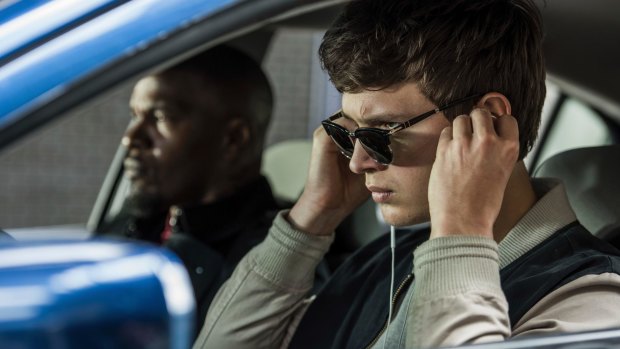 Ansel Elgort, right, and Jamie Foxx in a scene from Baby Driver.