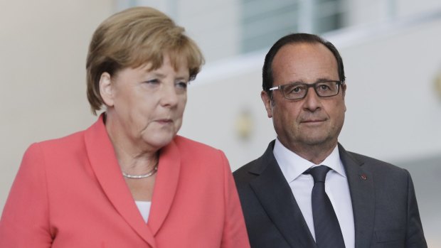 German Chancellor Angela Merkel and French President Francois Hollande on Monday: combining to elevate Europe's migrant crisis to top priority.