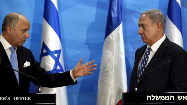 French Foreign Minister Laurent Fabius, left, with Israeli Prime Minister Benjamin Netanyahu in Jerusalem on Sunday.