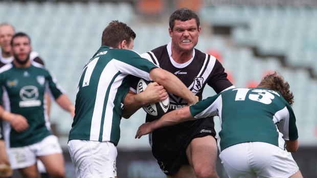 Rugby rumble: Magpies prop Ray Cashmere is tackled by the Randwick defence at Pirtek Stadium.