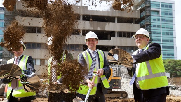 NSW Premier Mike Baird and Leighton Properties'  Andrew Borger turn the first sod to mark the official start of construction of the University of Western Sydney's new Parramatta high-rise campus.
