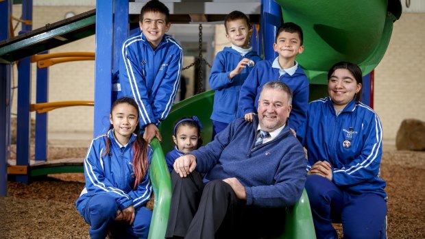 Principal Keith McDougall at Broadmeadows Primary School with some of his students.