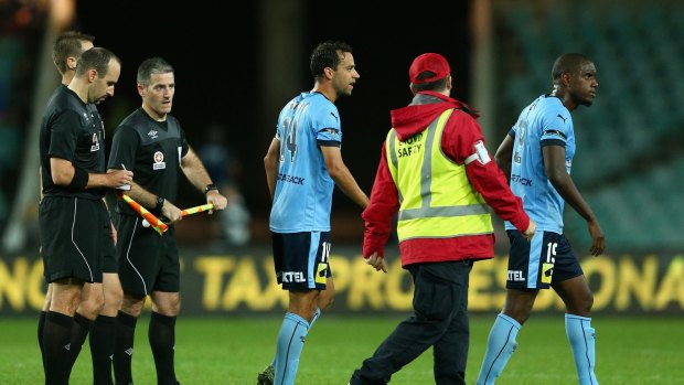 Far from satisfied: Sydney FC captain Alex Brosque walks away after a chat with the officials during the round six A-League match between Sydney FC and Melbourne Victory at Allianz Stadium.