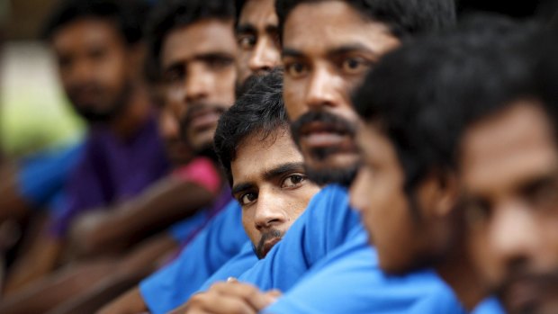 Men from Bangladesh, rescued by the Myanmar navy together..