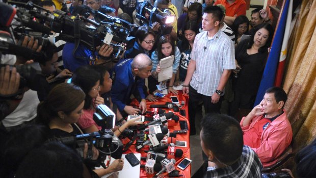 Rodrigo Duterte hols a press conference after being elected president of the Philippines on May 26.