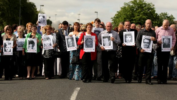Families of the victims of the Bloody Sunday shootings march from the Bogside area of Londonderry to the Guildhall in 2010, to read a preview of the Saville Inquiry report. 
