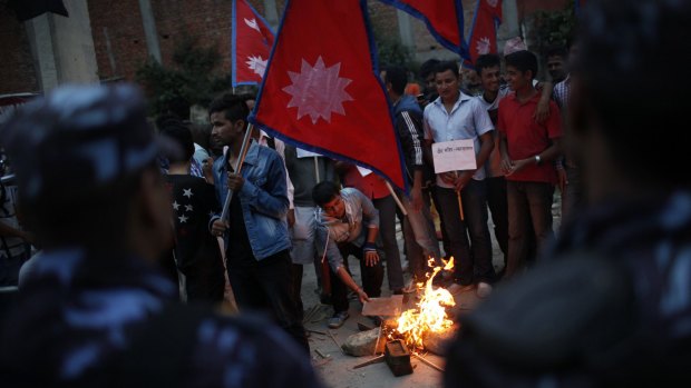 Students affiliated with Communist Party of Nepal near the Indian Embassy during a protest against the blockade of cargo trucks on Sunday.