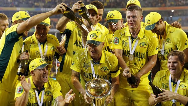 Australian captain Michael Clarke's teammates drench him with alcohol as they celebrate winning the World Cup. 