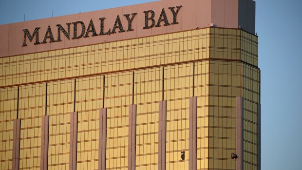 Two hotel employees had called for help and reported that gunman Stephen Paddock sprayed a hallway with bullets, striking an unarmed security guard in the leg.