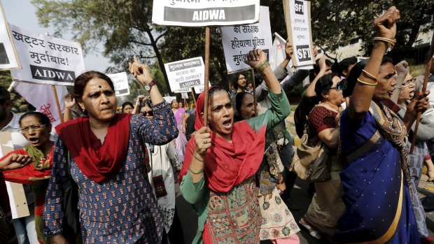 Activists of the All-India Democratic Women's Association (AIDWA) march in New Delhi demanding a probe into alleged rapes and sexual assaults in Murthal in February.