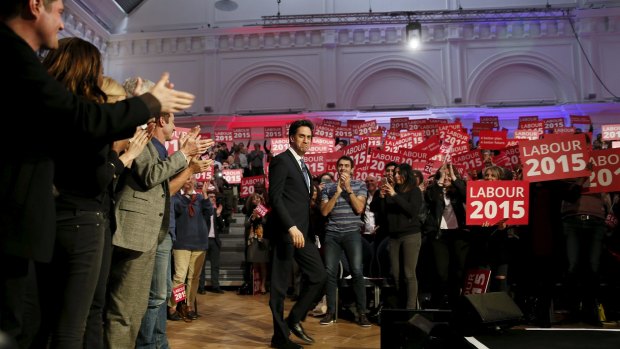 Opposition Leader Ed Miliband arrives on stage to deliver a campaign speech on Saturday. 