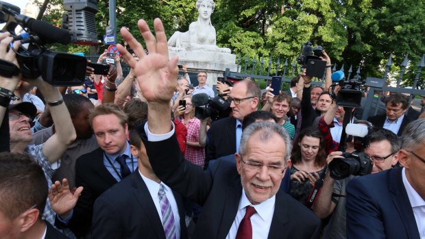 Alexander Van der Bellen, the winner of Austria's presidential election, waves to his supporters in Vienna. 