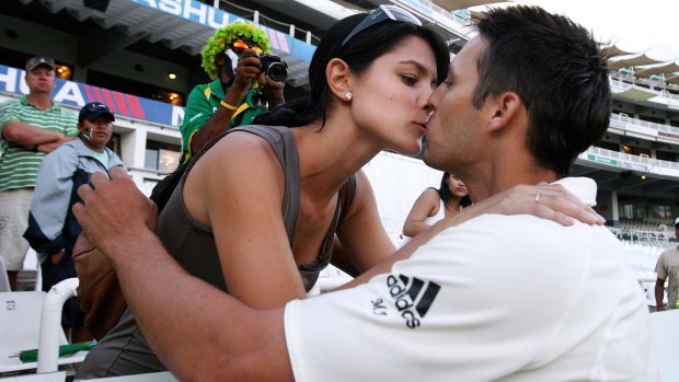 Happily ever after: Mitchell Johnson is congratulated by wife Jessica after his maiden Test century in Cape Town in 2009.