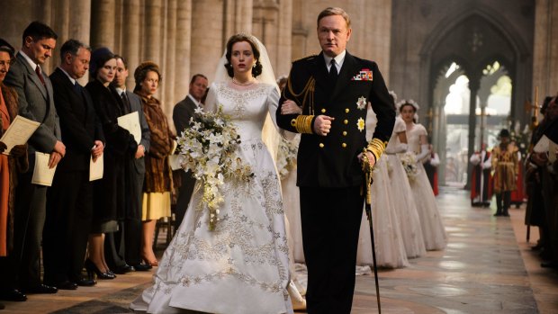 Claire Foy as Queen Elizabeth II and Jared Harris as King George VI in <i>The Crown</i>.