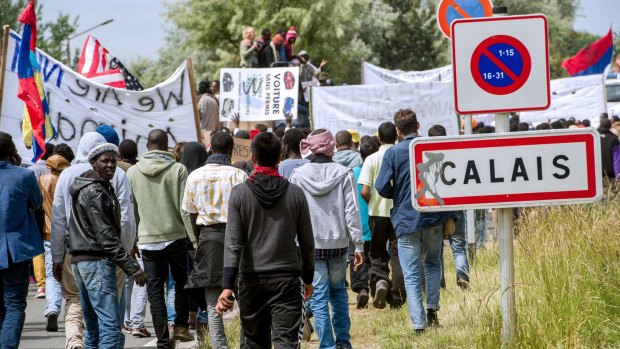 Migrants stage a demonstration in Calais, northern France.