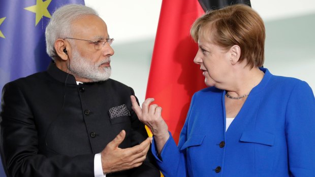Indian Prime Minister Narendra Modi says he and German Chancellor Angela Merkel are "meant for each other".