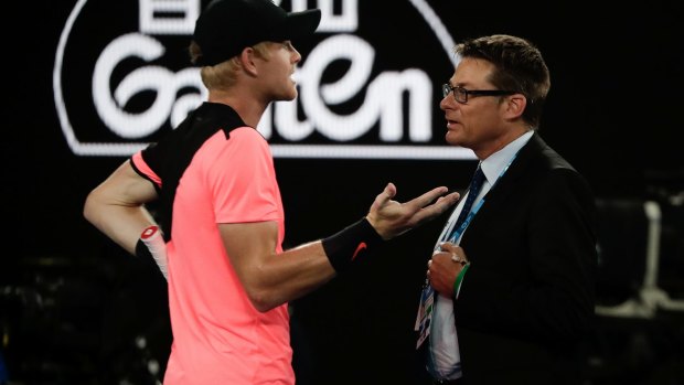 Kyle Edmund argues with an official over a Hawkeye challenge that he was not happy with.