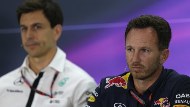 Infiniti Red Bull Racing Team principal Christian Horner speaks to the media in Abu Dhabi. Next to him is Mercedes GP executive director Toto Wolff.