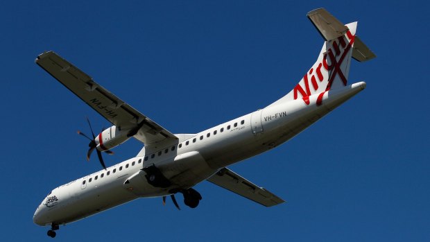 An ATR 72-600 aircraft operated by Virgin Australia prepares to land at Sydney Airport.