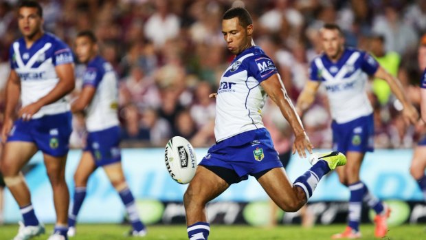 Mbye curious about new role: Bulldogs halfback Moses Mbye kicks during the round one win over the Manly Sea Eagles.
