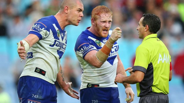 Fireworks: Canterbury's David Klemmer and James Graham confront referee Gerard Sutton after a controversial penalty in the clash with the Rabbitohs in round five.
