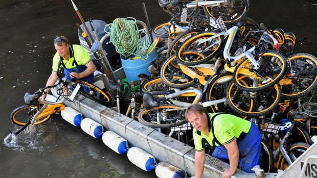Contractors dragged a bargefull of oBikes from the Yarra last month.