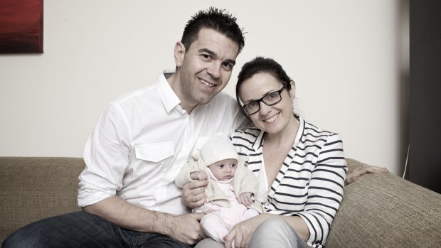 Darren Pinks, wife Clair and six-week-old Saffron, who wa born to a surrogate mother in India in 2012, before India shut down surrogacy services available to Australian clients. 
