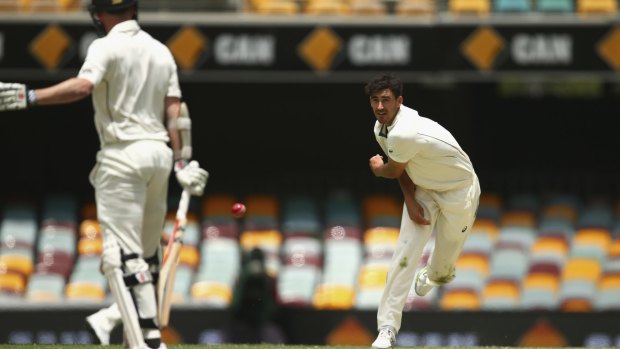 Blowing his cool: Mitchell Starc hurls the ball during day five of the first Test in Brisbane.