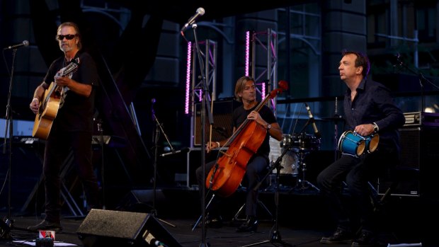 Steve Kilby from The Church performs in Martin Place for the Music for
Mercy concert.