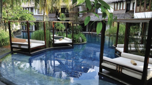 Poolside at the Villa Samadhi in Kuala Lumpur.