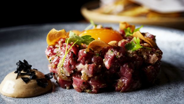 Rustic, hand-chopped lamb tartare at 6 Head.